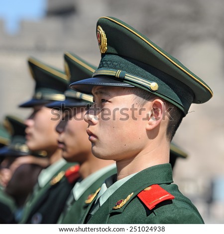 BEIJING - NOV 8: Soldiers stand guard in Tiananmen area during China\'s 18th National Congress on November 8, 2012 in Beijing, China.Security is extra tight because of leadership transition.