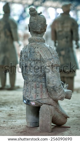 XIAN - APRIL 9: exhibition of the famous Chinese Terracotta Warriors on April 9, 2014 in XIan, China. The terracotta warriors are made in 210-209 BCE to protect the emperor in his afterlife.