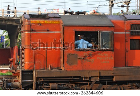 CALCUTTA - MARCH 27: locomotive of an Indian Railways train on March 27, 2014 in Calcutta, India. Indian Railways is a state-owned enterprise and carries 8.4 billion passengers annually.