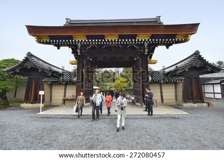 KYOTO - APRIL 7: tourists visit the Imperial Palace on April 7, 2015 in Kyoto, Japan. The palace was destroyed by fire but rebuilt in its original style; the present buildings date from 1855.