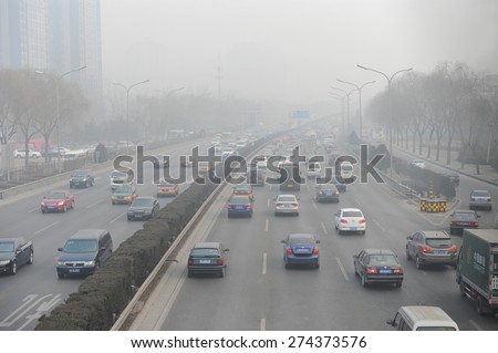 BEIJING - FEB 28: severe air pollution in Beijing city center on February 28, 2013 in Beijing, China. Beijing has an alarming level of air pollution (AQI >500), one of the highest in the world.