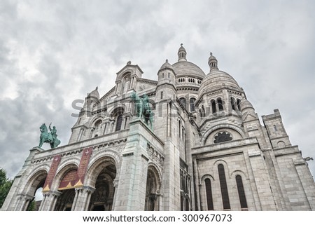 PARIS - JULY 20:  Basilica of the Sacred Heart on July 20, 2015 in Paris, France.  The Basilica of the Sacred Heart (Sacre-Coeur) is an important Roman Catholic church located in Montmartre, Paris.