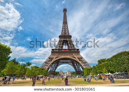 PARIS - JULY 20: tourists visit the Eiffel Tower on July 20, 2015 in Paris, France. In year 2014 more than 15 million tourists visited the city of Paris.