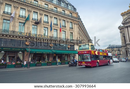 PARIS - JULY 20: Tourists visit the city center on July 20, 2015 in Paris, France. In year 2014 more than 15 million tourists visited the city of Paris.