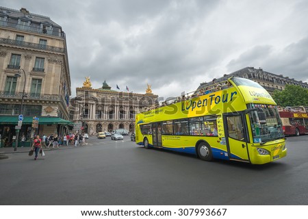 PARIS - JULY 20: Tourists visit the city center on July 20, 2015 in Paris, France. In year 2014 more than 15 million tourists visited the city of Paris.