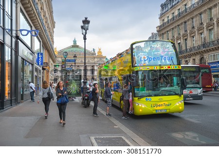 PARIS - JULY 20: tourists visit the Paris city center on July 20, 2015 in Paris, France. In year 2014 more than 15 million tourists visited the city of Paris.