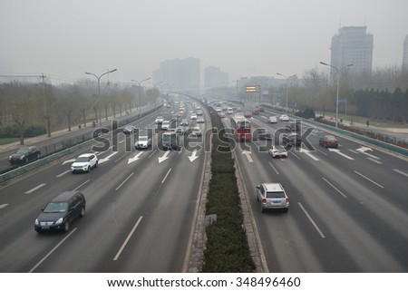 BEIJING - DEC 8: severe air pollution in Beijing city center on December 8, 2015 in Beijing, China. The Chinese government issued the historical first Red Alert on air pollution on this day.