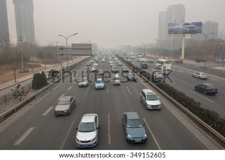 BEIJING - DEC 8: severe air pollution in Beijing city center on December 8, 2015 in Beijing, China. The Chinese government issued the historical first Red Alert on air pollution on this day.