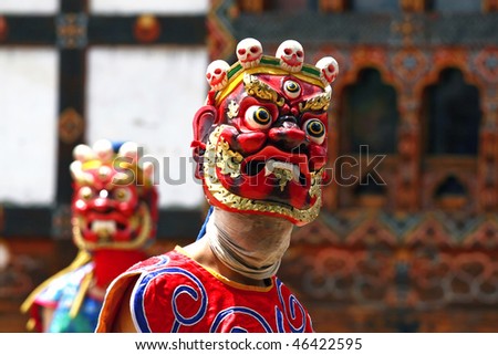 BHUTAN - APRIL 15: Dancers with colorful mask dance at a yearly festival called tsechu on April 15, 2008 in Bhutan
