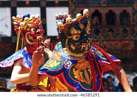 BHUTAN - APRIL 15: Dancers with colorful mask dance at a yearly festival called tsechu on April 15, 2008 in Bhutan