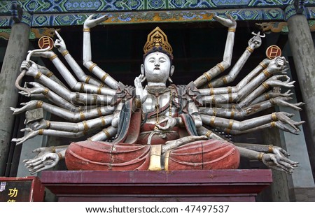 stock-photo-statue-of-thousand-arms-buddha-47497537.jpg