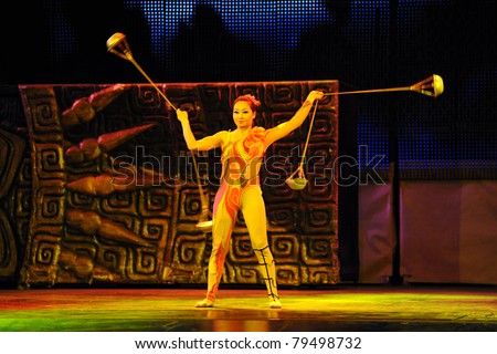 BEIJING - JUNE 5: Beijing Acrobatics Troupe artists perform at the famous Chaoyang Theatre on June 5, 2011, in Beijing, China.