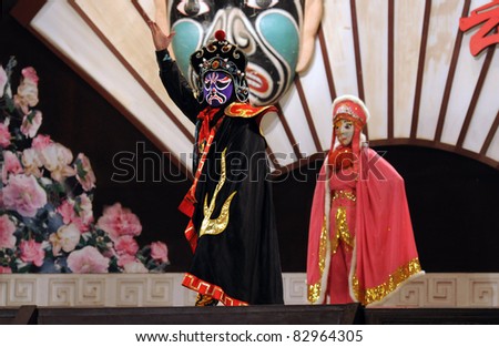 CHENGDU - AUGUST 12: Actors of the Sichuan Opera Troupe perform the famous \