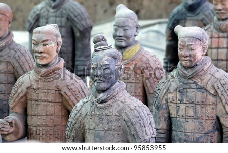 XIAN - APRIL 6: famous Chinese terracotta army figures are exhibited on April 6, 2011 in Xian, China. The figures date back to 210 BC and belong to China\'s most important discoveries.