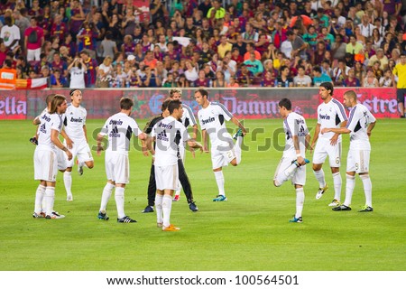 BARCELONA - AUGUST 17: Madrid players warm-up before the Spanish Super Cup final match between FC Barcelona and Real Madrid, 3 - 2, on August 17, 2011 in Camp Nou stadium, Barcelona, Spain.