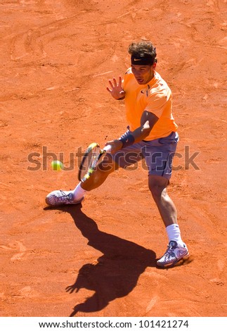 BARCELONA - APRIL 29: Spanish tennis player Rafael Nadal in action during his final match against David Ferrer at Barcelona tennis tournament Conde de Godo on April 29, 2012, in Barcelona, Spain.