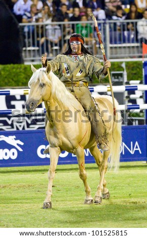 BARCELONA, SPAIN - SEPTEMBER 23: Jean Marc Imbert performs during a horse exhibition at the CSIO 100th International Jumping Competition, on September 23, 2011 in Real Club de Polo, Barcelona, Spain.