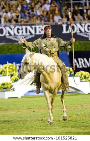 BARCELONA, SPAIN - SEPTEMBER 23: Jean Marc Imbert performs a horse exhibition during the CSIO 100th International Jumping Competition, on September 23, 2011, in Real Club de Polo, Barcelona, Spain.
