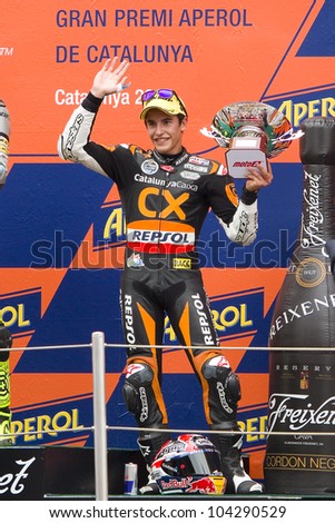 BARCELONA - JUNE 3: Marc Marquez (3rd) celebrating his trophy in the podium after the race of Moto2 Grand Prix of Catalunya, on June 3, 2012 in Barcelona, Spain. The winner was Andrea Iannone.