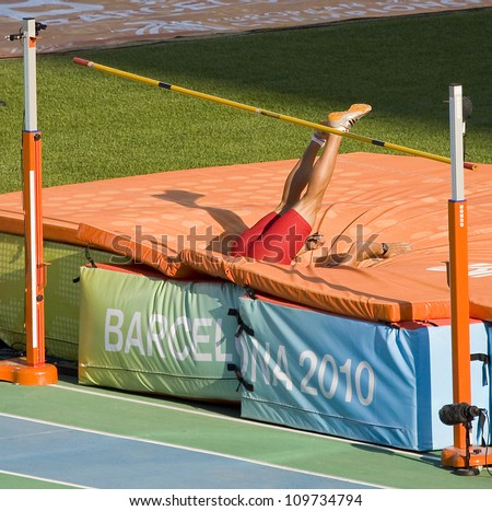 BARCELONA - JULY 28: Unidentified athlete compete at Decathlon High Jump during European Athletics Championships Barcelona 2010, on July 28, 2010 in Barcelona, Spain.