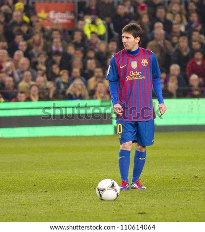 BARCELONA JANUARY 25 Lionel Messi of FCB in action during the Spanish Cup match between FC Barcelona and Real Madrid final score 2 2 on January 25 2012 in Barcelona Spain. BARCELONA JANUARY 25 Lionel Messi of FCB in action during the Spanish Cup match between FC Barcelona and Real Madrid final score 2 2 on January 25 2012 in Barcelona Spain.