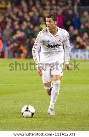 BARCELONA JANUARY 25 Cristiano Ronaldo of Madrid in action during the Spanish Cup match between FC Barcelona and Real Madrid final score 2 2 on January 25 2012 in Barcelona Spain. BARCELONA JANUARY 25 Cristiano Ronaldo of Madrid in action during the Spanish Cup match between FC Barcelona and Real Madrid final score 2 2 on January 25 2012 in Barcelona Spain.