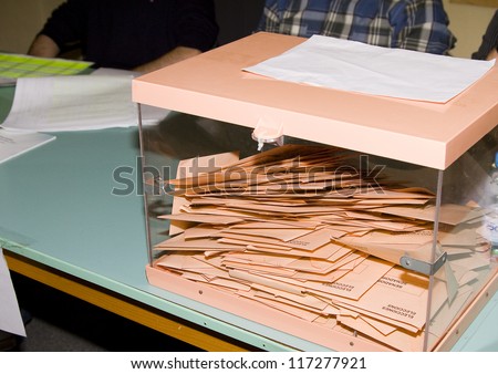 BARCELONA, SPAIN - NOVEMBER 20: Some votes inside a box in a polling station during Spanish General Elections on November 20, 2011 in Barcelona, Spain.