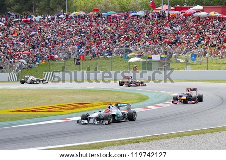Barcelona - May 13: Some Cars Racing At The Race Of Formula One Spanish Grand Prix At Catalunya Circuit, On May 13, 2012 In Barcelona, Spain. The Winner Was Pastor Maldonado Of Williams Renault Team.