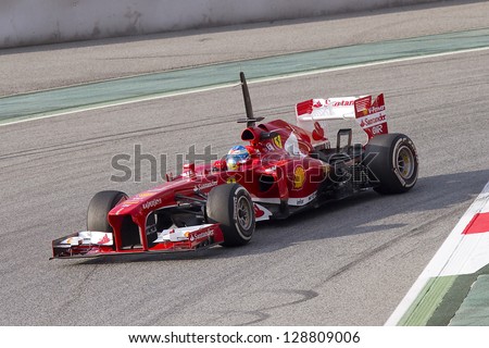 BARCELONA - FEBRUARY 19: Fernando Alonso racing with his new Ferrari F138 at Formula One Teams Test Days at Catalunya circuit on February 19, 2013 in Montmelo, Barcelona, Spain.