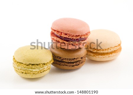 Macarons, a french sweet meringue-based confection made with eggs, icing sugar, granulated sugar, almond powder or ground almond, and food colouring.