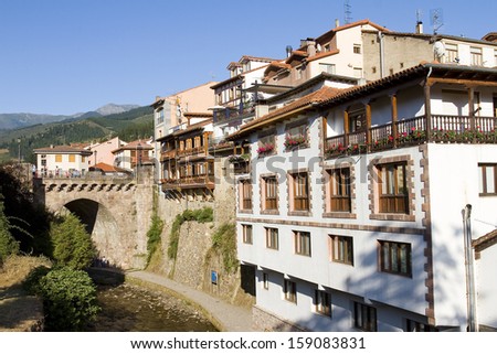 POTES, SPAIN - AUGUST 17: View of Potes, one of the most beautiful villages of Spain and one of the most touristic places in Cantabria region, on August 17, 2013, in Potes, Spain.