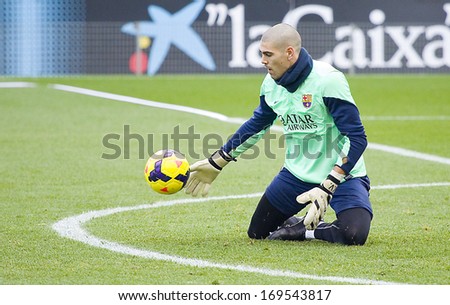 BARCELONA, SPAIN - JANUARY 3: Victor Valdes in action at FC Barcelona team in open doors training session at Mini Estadi stadium, with 13,200 spectators, on January 3, 2014, in Barcelona, Spain.