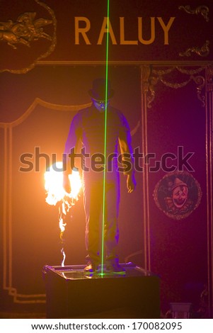 BARCELONA - JANUARY 1: Unidentified man performs during the new spectacle of Raluy Circus, on January 1, 2014 in Barcelona, Spain.