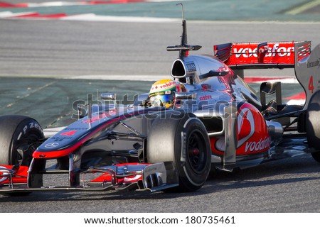 BARCELONA - FEBRUARY 21: Lewis Hamilton of McLaren Mercedes F1 team racing at Formula One Teams Test Days at Catalunya circuit on February 21, 2012 in Barcelona, Spain.