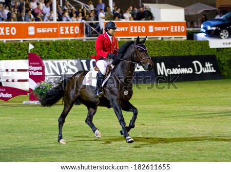BARCELONA, SPAIN - SEPTEMBER 23: Chris Pratt from Canada in action during the CSIO 100th International Jumping Competition, on September 23, 2011, in Real Club de Polo, Barcelona, Spain.