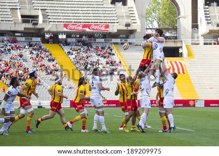 BARCELONA - APRIL 19: Some players in action at rugby Top14 french league match between USAP Perpignan and Toulon (white), final score 31-46, on April 19, 2014, in Barcelona Olympic stadium, Spain.