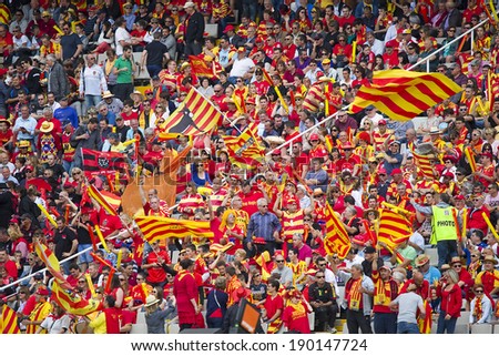BARCELONA - APRIL 19: Some USAP supporters in action at rugby Top14 french league match between USAP Perpignan and Toulon, final score 31-46, on April 19, 2014, in Barcelona Olympic stadium, Spain.
