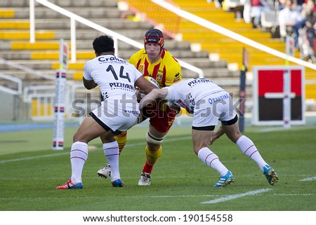 BARCELONA - APRIL 19: Some players in action at rugby Top14 french league match between USAP Perpignan and Toulon (white), final score 31-46, on April 19, 2014, in Barcelona Olympic stadium, Spain.