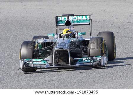 BARCELONA - MARCH 2: Lewis Hamilton racing with his Mercedes W04 at Formula One Teams Test Days at Catalunya circuit on March 2, 2013 in Montmelo, Barcelona, Spain.