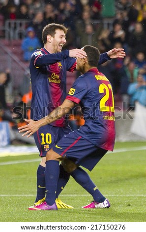 BARCELONA - JANUARY 27: Leo Messi of FCB (L) celebrating his goal at the Spanish League match between FC Barcelona and Osasuna, final score 5 - 1, on January 27, 2013, in Barcelona, Spain.