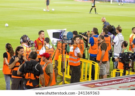 BARCELONA - AUGUST 17: Sport journalists working at the Spanish Super Cup final match between FC Barcelona and Real Madrid, 3 - 2, on August 17, 2011 in Camp Nou stadium, Barcelona, Spain.