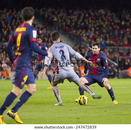 BARCELONA - JANUARY 27: Lionel Messi of FCB (R) in action at the Spanish League match between FC Barcelona and Osasuna, final score 5 - 1, on January 27, 2013, in Barcelona, Spain.