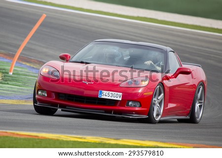 VALENCIA, SPAIN - APRIL 25: A red Chevrolet Corvette C6 take part in American Fest weekend organizated in circuit Ricardo Tormo, on April 25, 2015, in Cheste, Valencia, Spain.