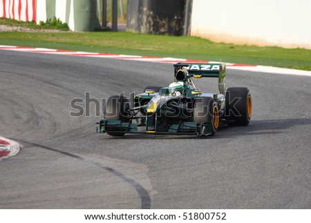 BARCELONA - FEBRUARY 28: Heikki Kovalainen (Lotus) tests his new car during Formula One Teams Test Days at Catalunya circuit February 28, 2010 in Barcelona.