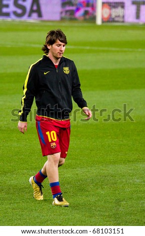 BARCELONA - DECEMBER 13: Leo Messi on the soccer field at Nou Camp Stadium. The Spanish Soccer League team FC Barcelona beat the Real Sociedad, 5-0, December 13, 2010 in Barcelona (Spain).
