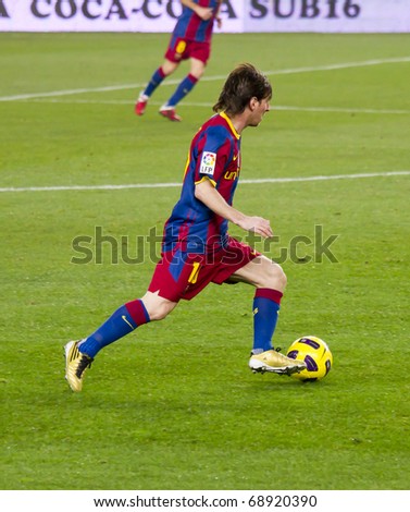 BARCELONA - DECEMBER 13: Nou Camp soccer stadium, Spanish Football League match: FC Barcelona - Real Sociedad, 5 - 0. In the picture, Leo Messi in action. December 13, 2010 in Barcelona (Spain).
