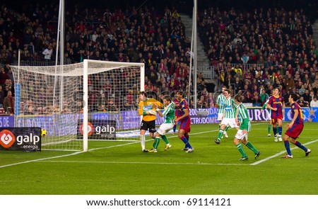 BARCELONA - JANUARY 12: Nou Camp football stadium, soccer Spanish Cup: FC Barcelona - Real Betis, 5 - 0. In the picture, Seydou Keita in action. January 12, 2011 in Barcelona (Spain).