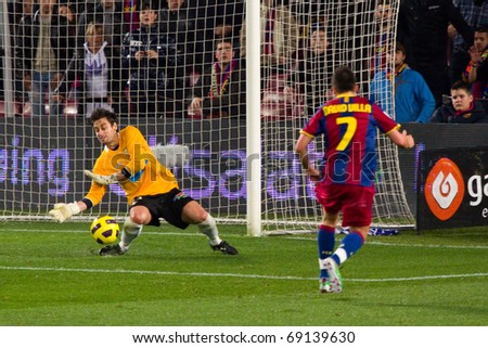 BARCELONA - JANUARY 12: Nou Camp football stadium, soccer Spanish Cup: FC Barcelona - Real Betis, 5 - 0. In the picture, David Villa shooting a goal. January 12, 2011 in Barcelona (Spain).