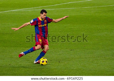 BARCELONA - JANUARY 12: Nou Camp football stadium, soccer Spanish Cup match: FC Barcelona - Real Betis, 5 - 0. In the picture, Sergio Busquets in action. January 12, 2011 in Barcelona (Spain).