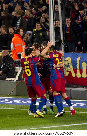 BARCELONA - DECEMBER 13: Nou Camp stadium, Spanish Soccer League match: FC Barcelona - Real Sociedad, 5 - 0. In the picture, players celebrating a goal. December 13, 2010 in Barcelona (Spain).